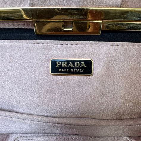 prada pleated raso clutch|More.